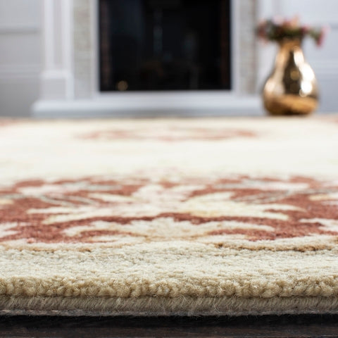Bergama Rug | Safavieh - BRG166C - Ivory / Rust