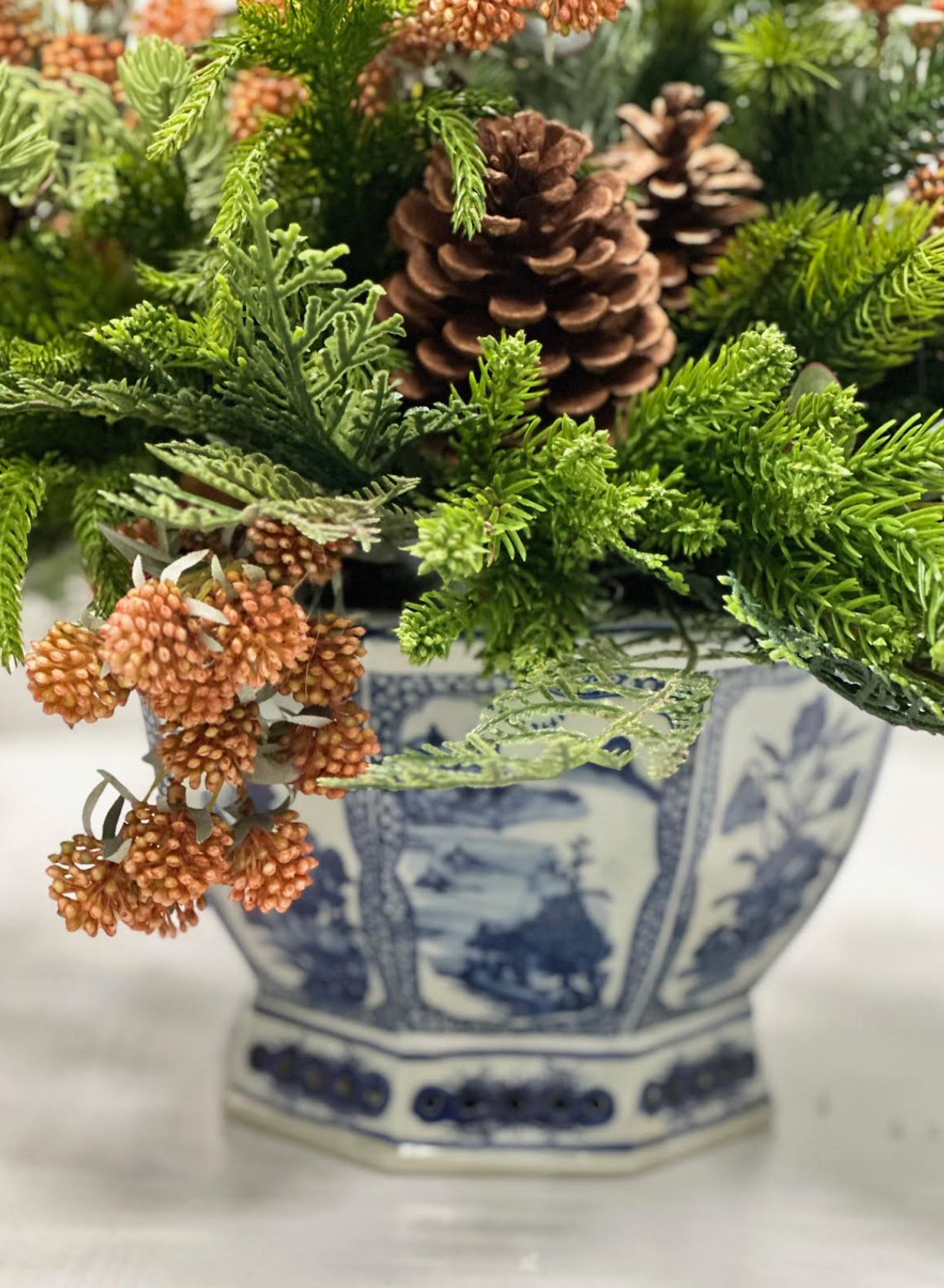 Evergreen, Pinecone, and Berries in Hexagon Planter