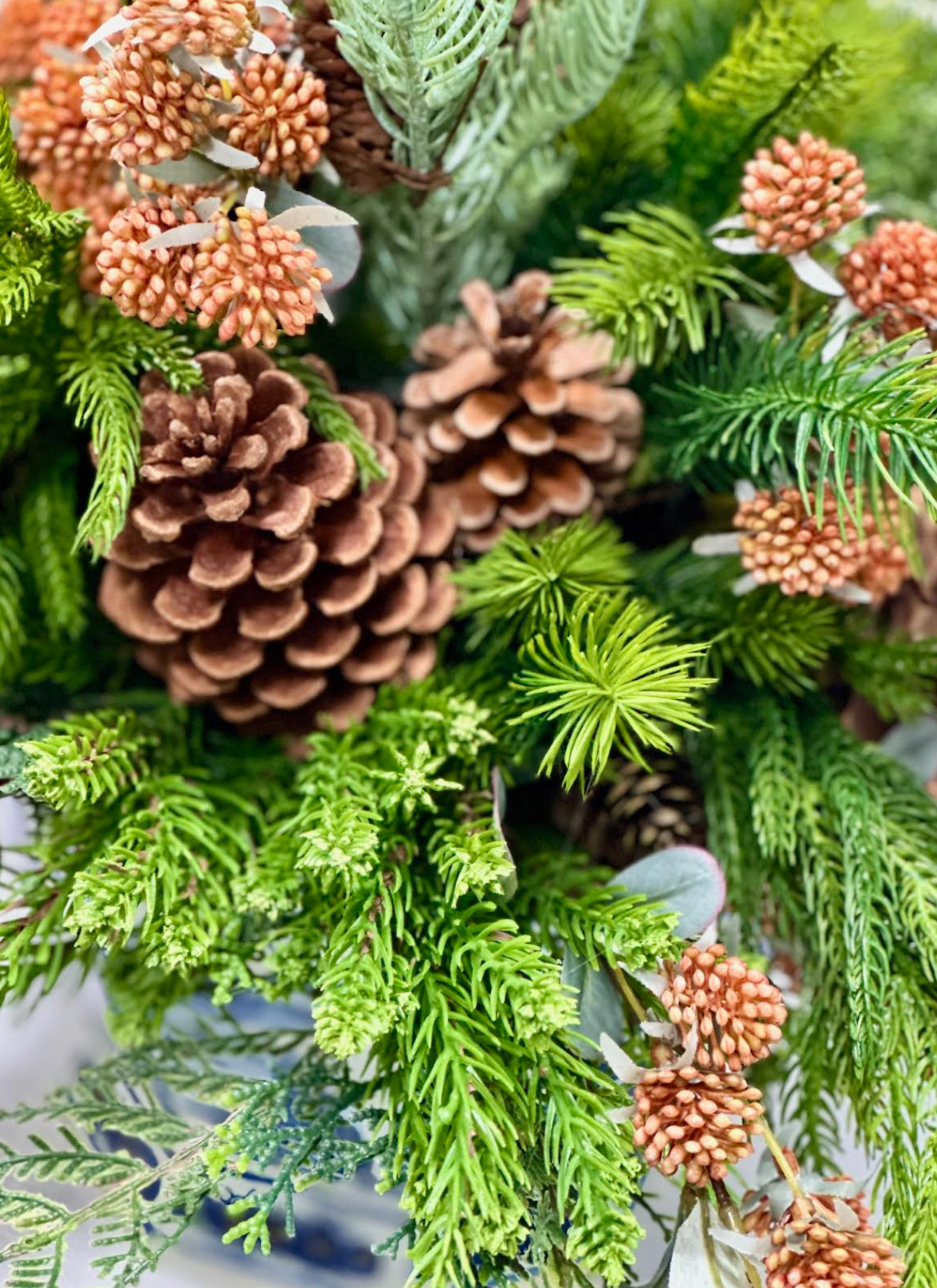 Evergreen, Pinecone, and Berries in Hexagon Planter