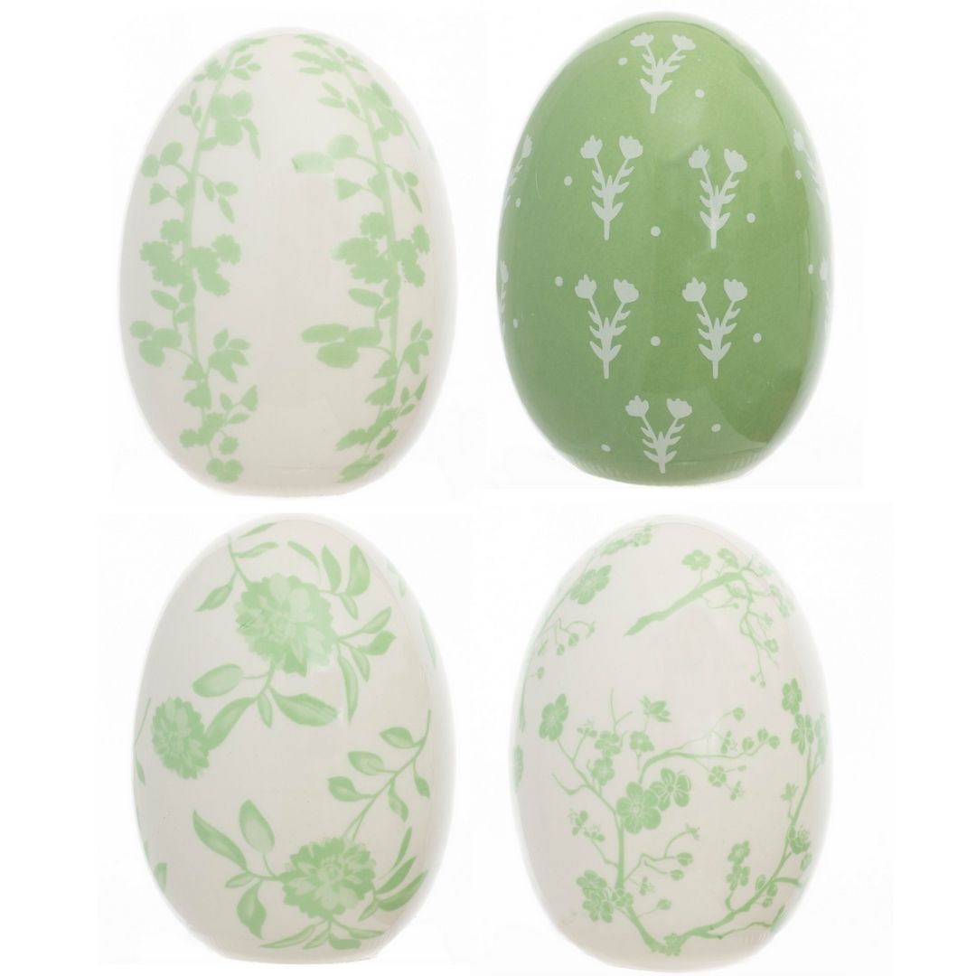 Stunning set of 4 porcelain eggs (green and white)